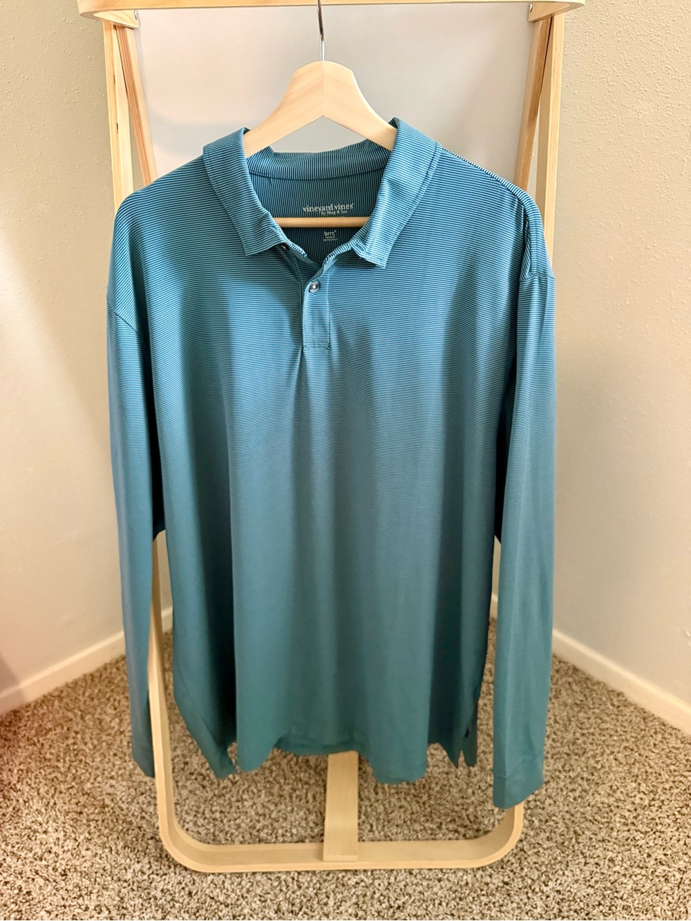 Vineyard Vines long-sleeve performance polo shirt in a blue striped design